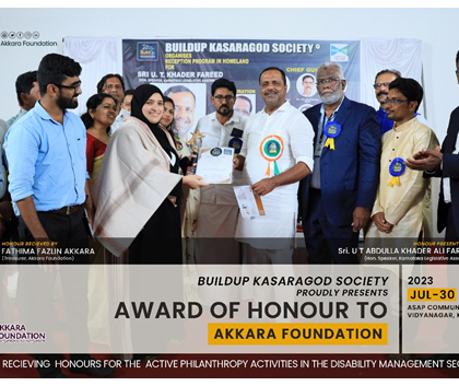 HONOUR RECEIVIED FROM BUILDUP KASARAGOD SOCIETY